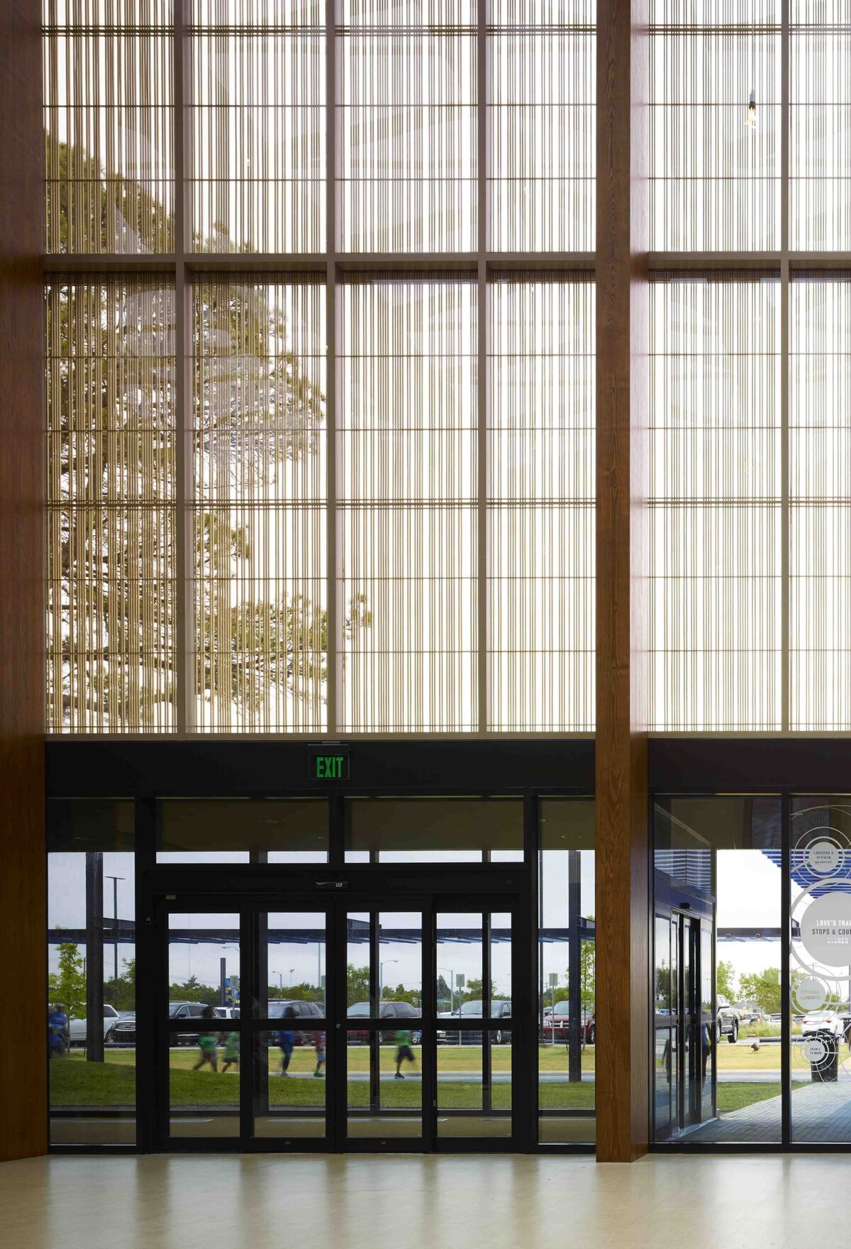 OKAWOOD wood-grille glazing at the entrance hall of the Oklahoma Science Museum, designed by Elliott + Associates Architects