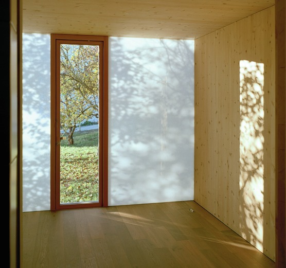 Biohotel Apfelgarten interior — KAPILUX W with vision glass combination, wood-clad room