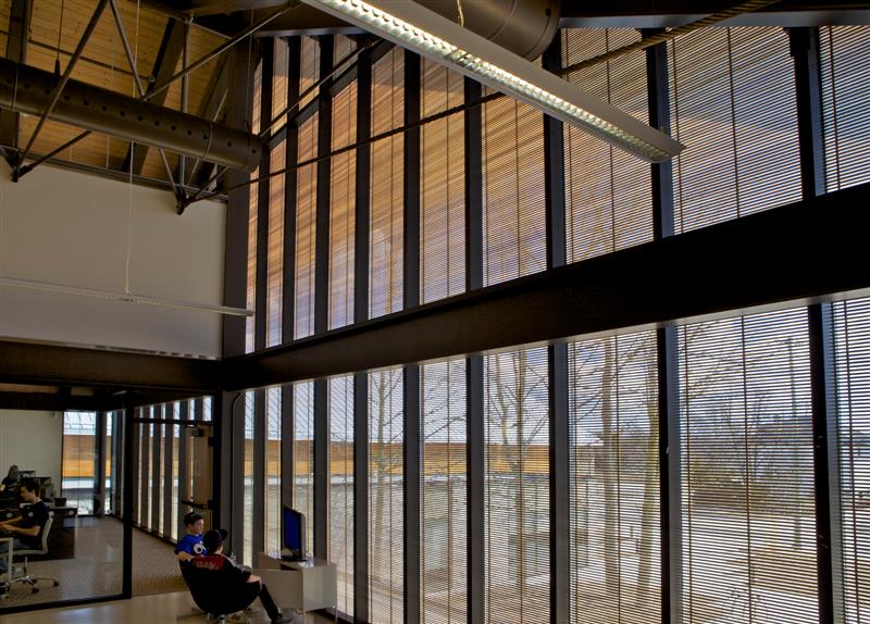 Brooklin Community Centre and Library interior — OKAWOOD wood-rib glazing panels with warm diffuse daylight