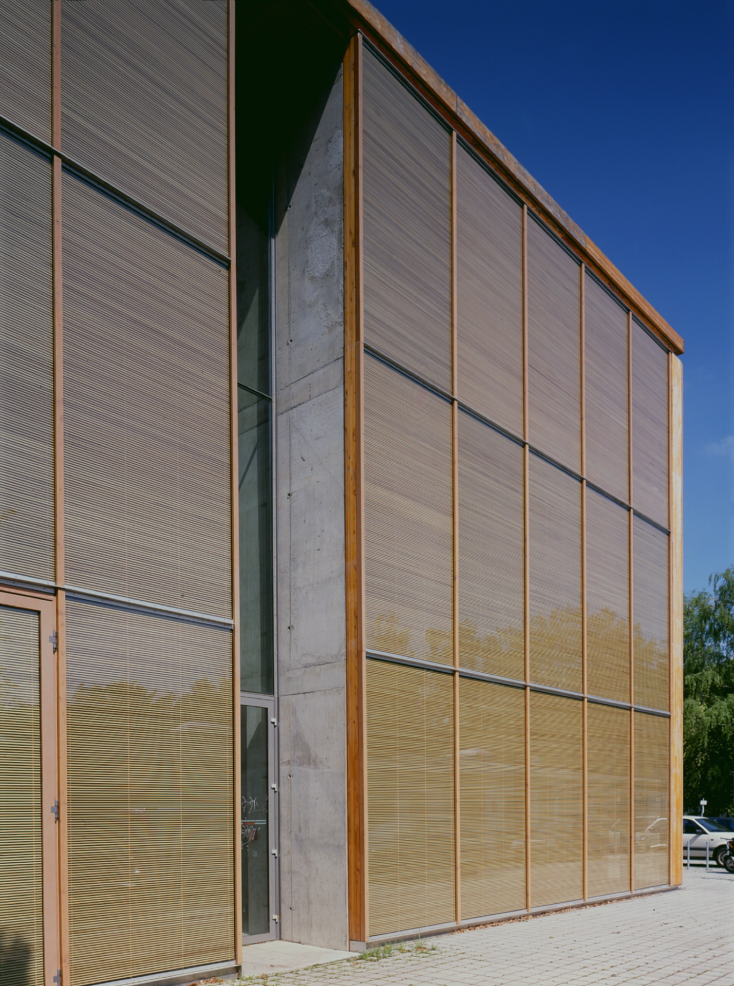 Wiesbaden Fachhochschule facade detail — OKAWOOD horizontal wood-rib panels close up